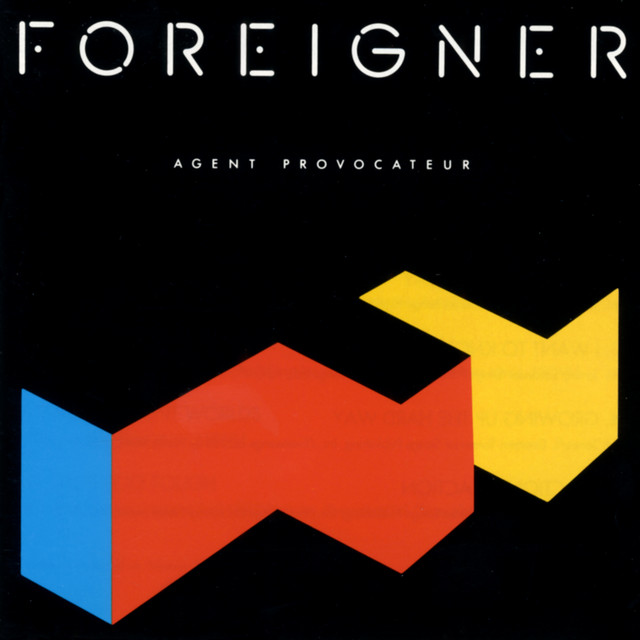 Album cover for Agent Provocateur by Foreigner, featuring black dominant palette and typographic composition.