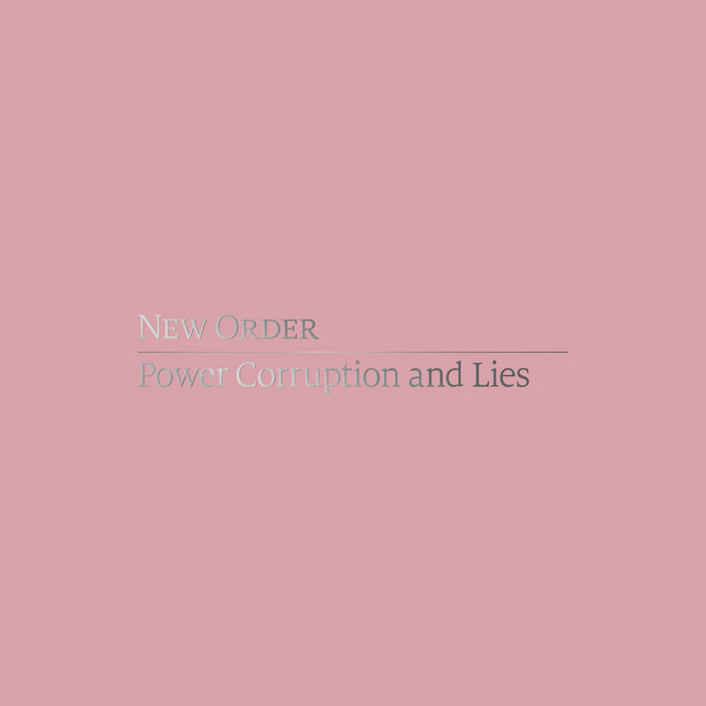 Album cover for Power Corruption and Lies (Definitive Edition) by New Order, featuring pink dominant palette and typographic composition.
