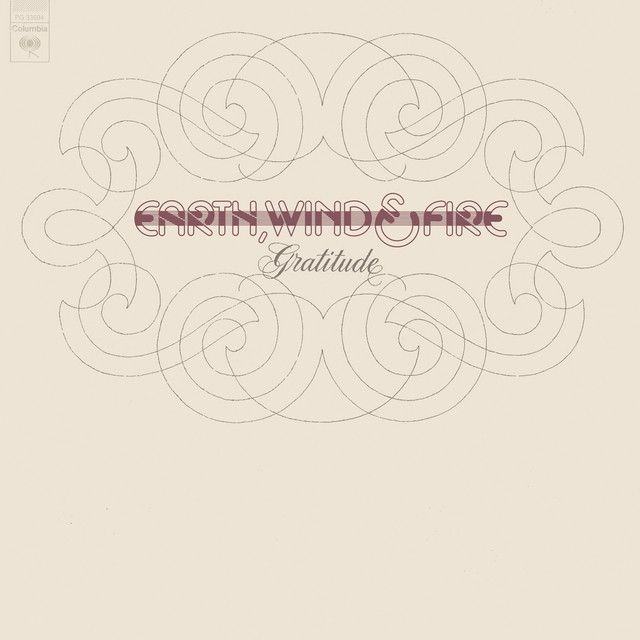 Album cover for Gratitude by Earth, Wind & Fire, featuring white dominant palette and typographic composition.
